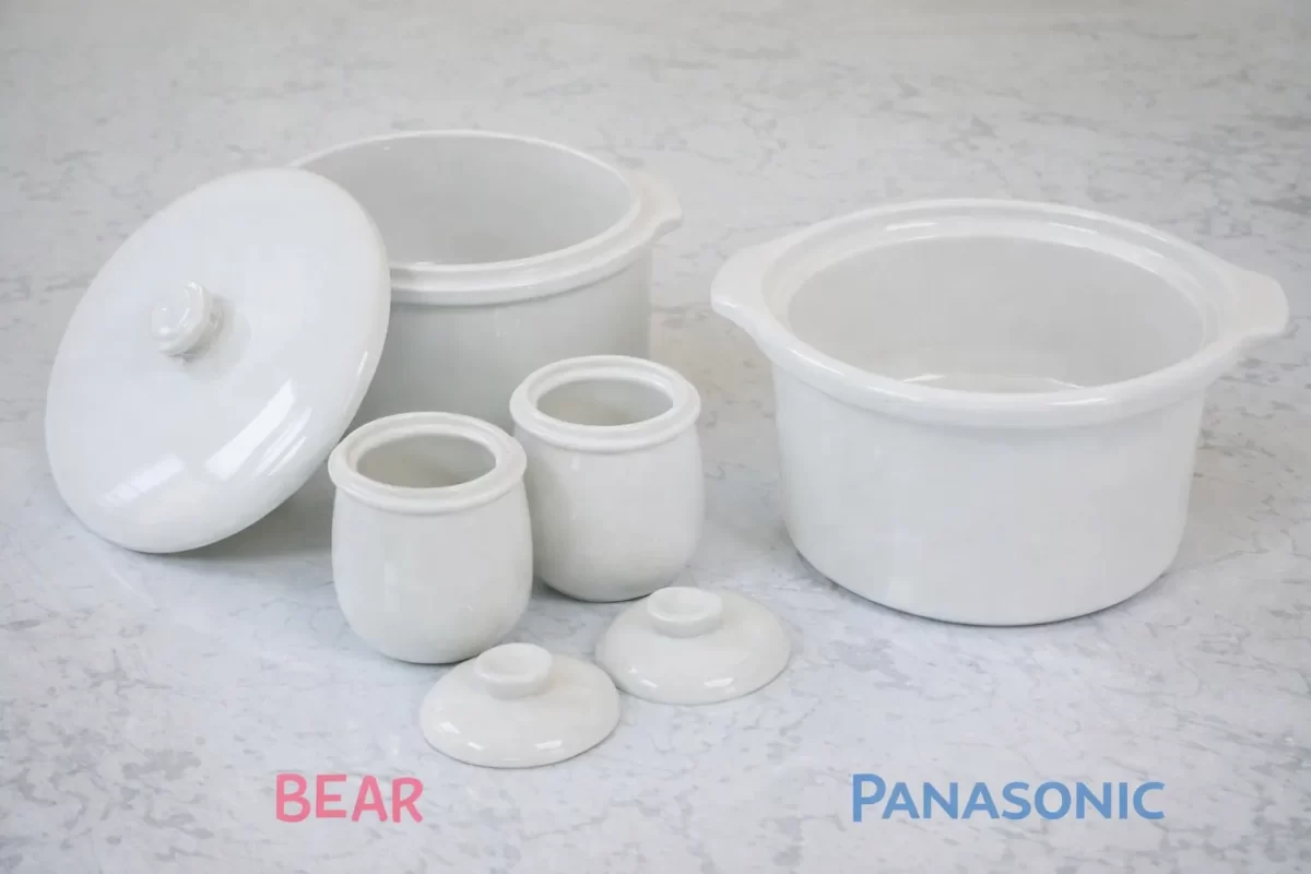  Cận cảnh bộ thố sứ 1 lớn 2 nhỏ của nồi Bear và lòng nồi sứ dung tích lớn của Panasonic]