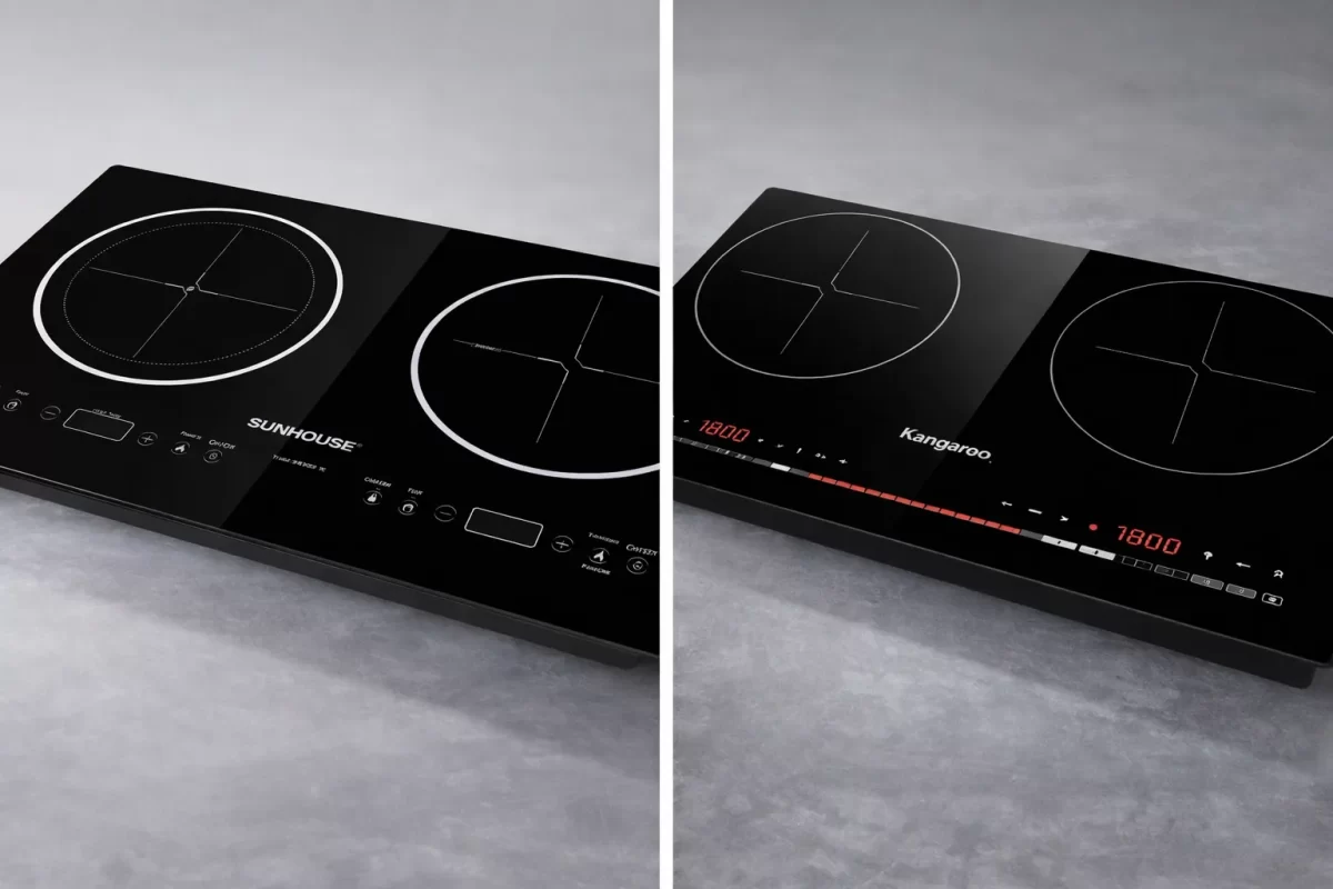 Bức ảnh chụp góc nghiêng mặt kính của hai chiếc bếp từ đôi: Một bên là Sunhouse với các họa tiết viền bo tròn quanh mâm nấu, một bên là Kangaroo với thiết kế tối giản, bảng điều khiển trượt slider